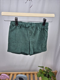 Tmavě zelené kraťasy H&M 104