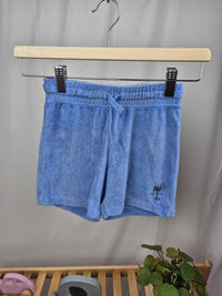 Modré froté kraťasy H&M 104